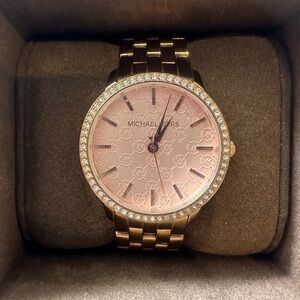 Michael Kors rose gold with pink face